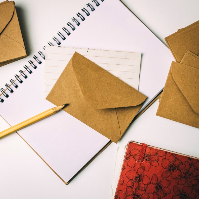 Picture of envelope and notebook